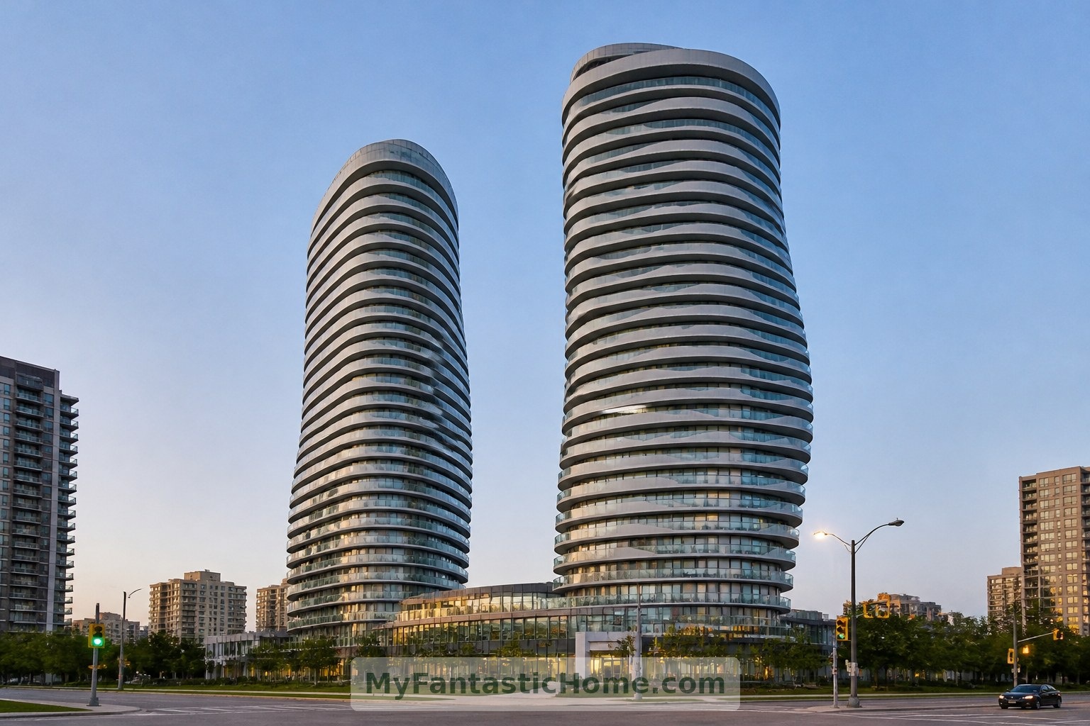 Gerçek yapılar: Mississauga’daki Absolute World kuleleri, yuvarlak hatlı profilleri kesintisiz balkon şeritleriyle birleştiriyor.